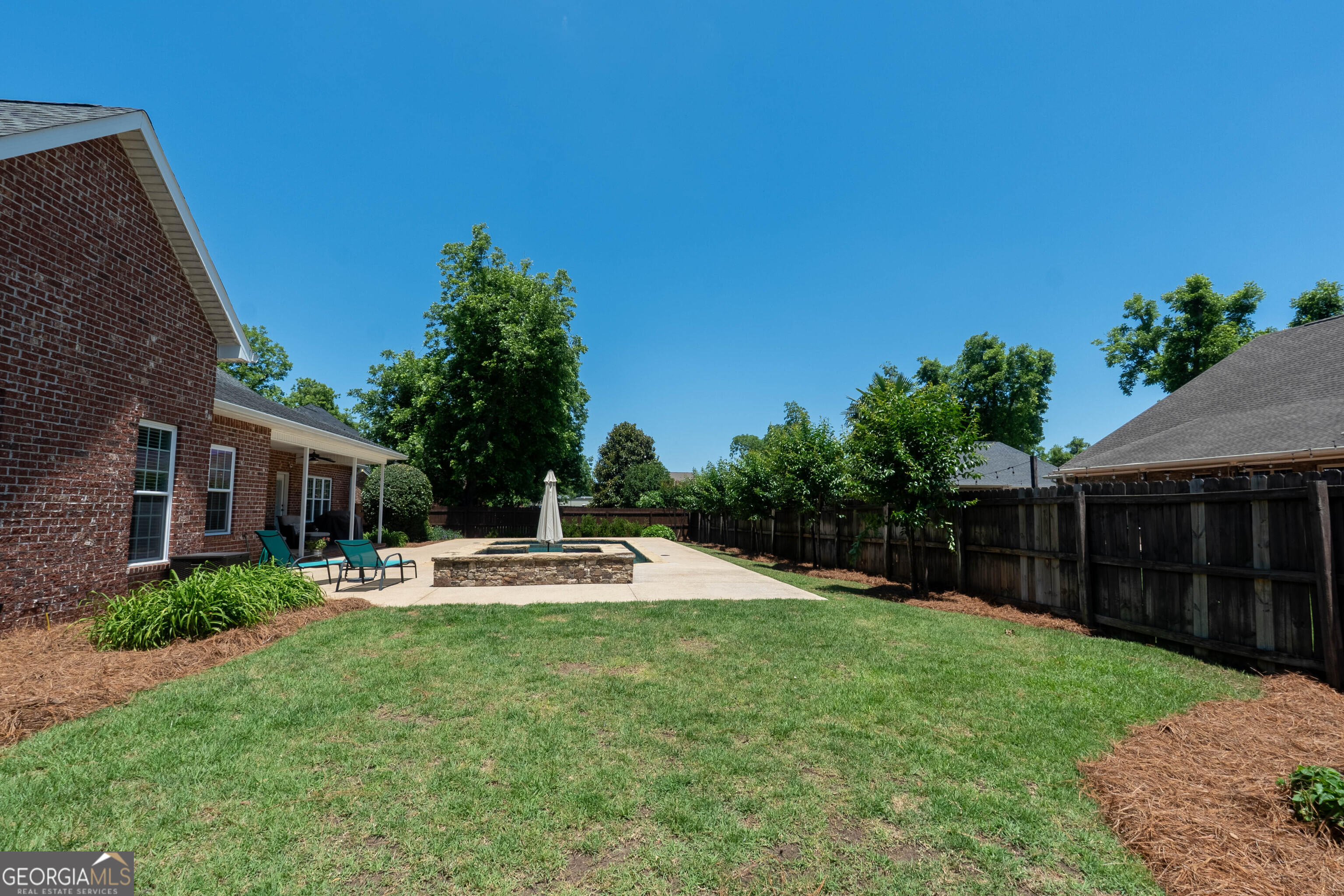 501 Old Bridge Road Warner Robins, GA 31088 - Photo 52 of 54 a view of a house with backyard and sitting area