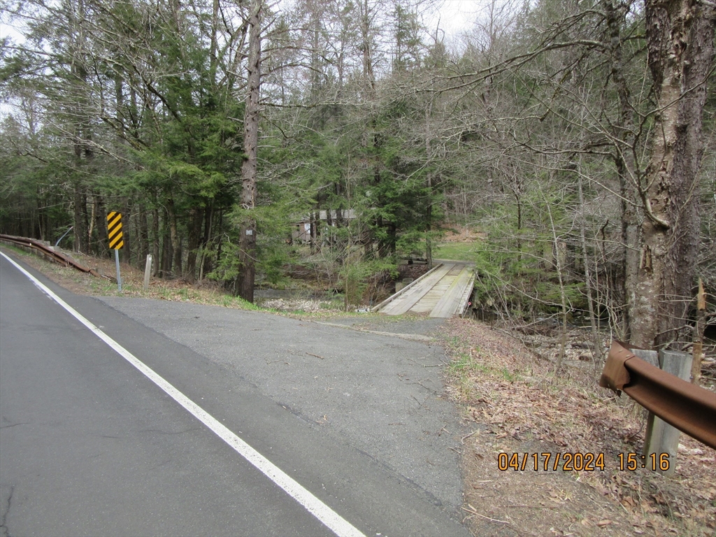 86 Ashfield Road Williamsburg, MA 01096 - Photo 19 of 20 a view of a road with trees in the background