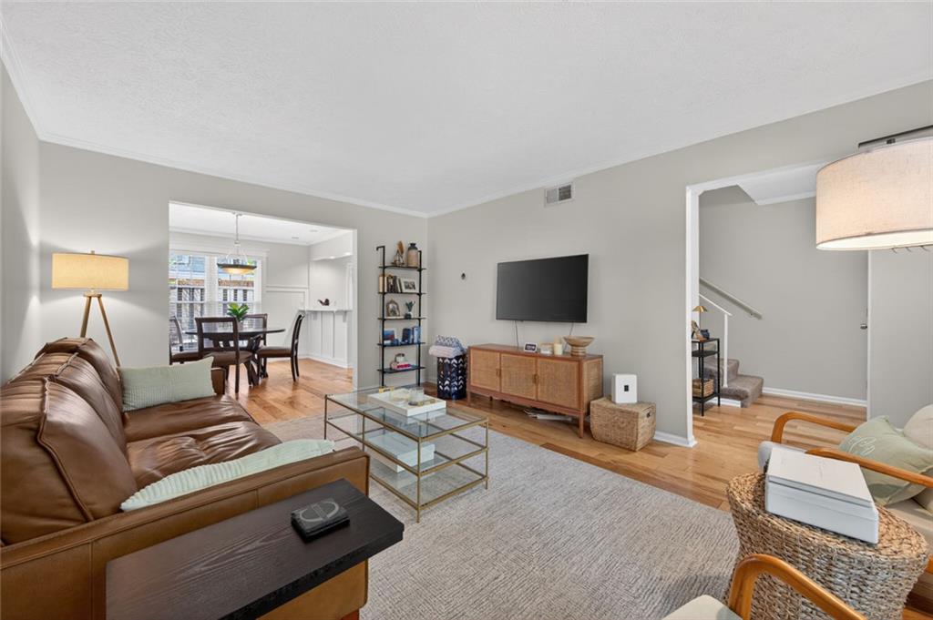 9 Scotland Place Northwest Atlanta, GA 30318 - Photo 11 of 49 a living room with furniture and a flat screen tv
