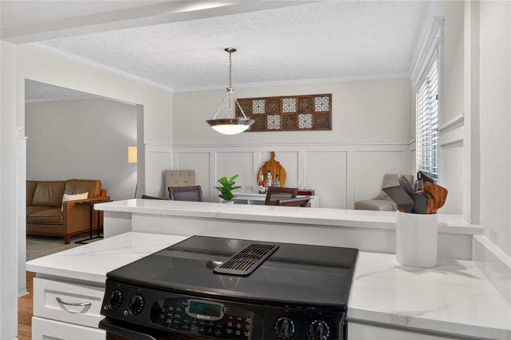 9 Scotland Place Northwest Atlanta, GA 30318 - Photo 18 of 49 a kitchen with a stove and a sink
