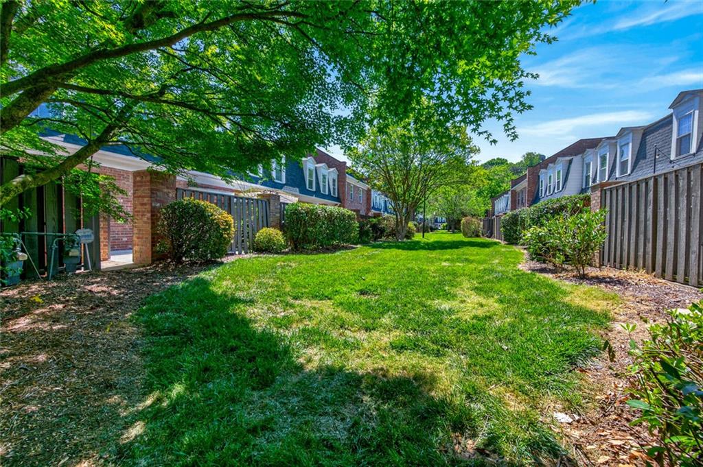 9 Scotland Place Northwest Atlanta, GA 30318 - Photo 30 of 49 a view of a backyard with a garden