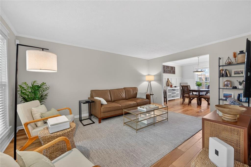 9 Scotland Place Northwest Atlanta, GA 30318 - Photo 3 of 49 a living room with furniture and wooden floor