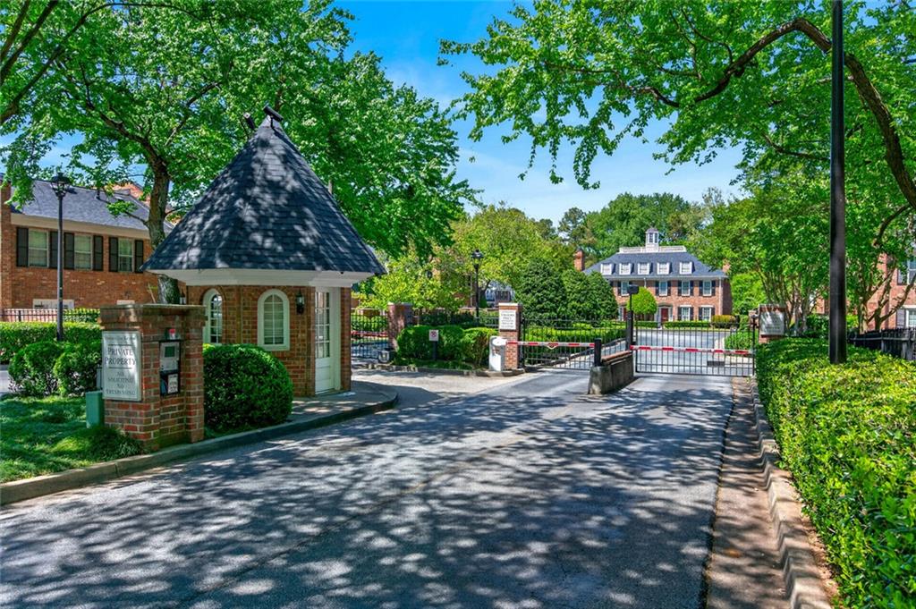 9 Scotland Place Northwest Atlanta, GA 30318 - Photo 34 of 49 a view of a house with garden and trees