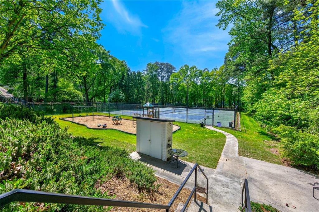 9 Scotland Place Northwest Atlanta, GA 30318 - Photo 39 of 49 a view of a swimming pool with a patio