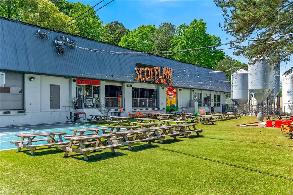 9 Scotland Place Northwest Atlanta, GA 30318 - Photo 48 of 49 a front view of house with outdoor seating