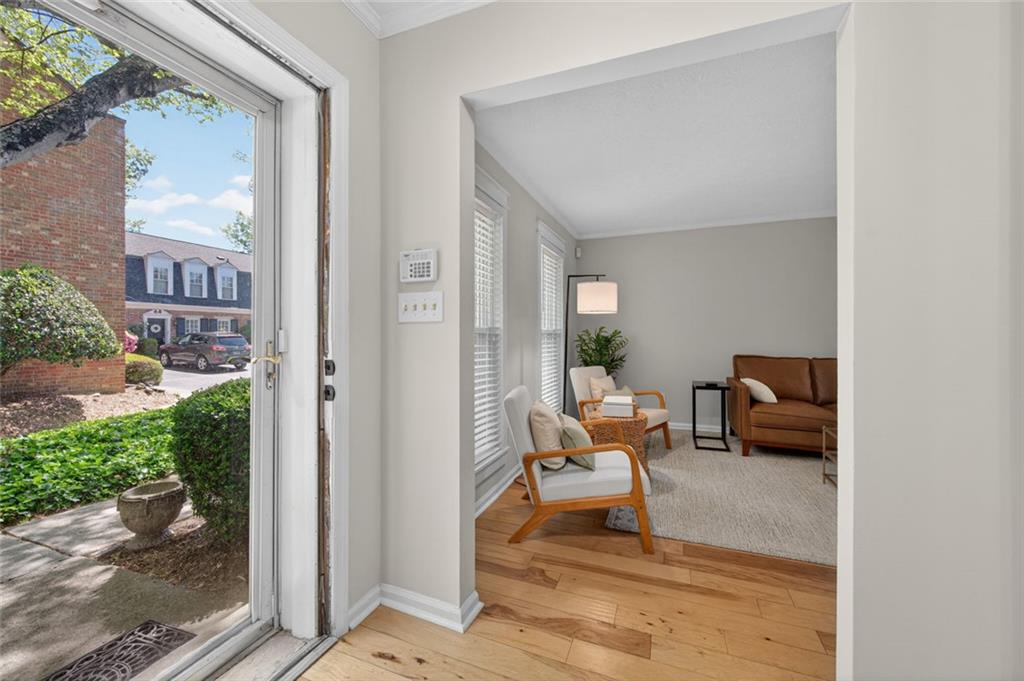 9 Scotland Place Northwest Atlanta, GA 30318 - Photo 10 of 49 a living room with furniture and a potted plant