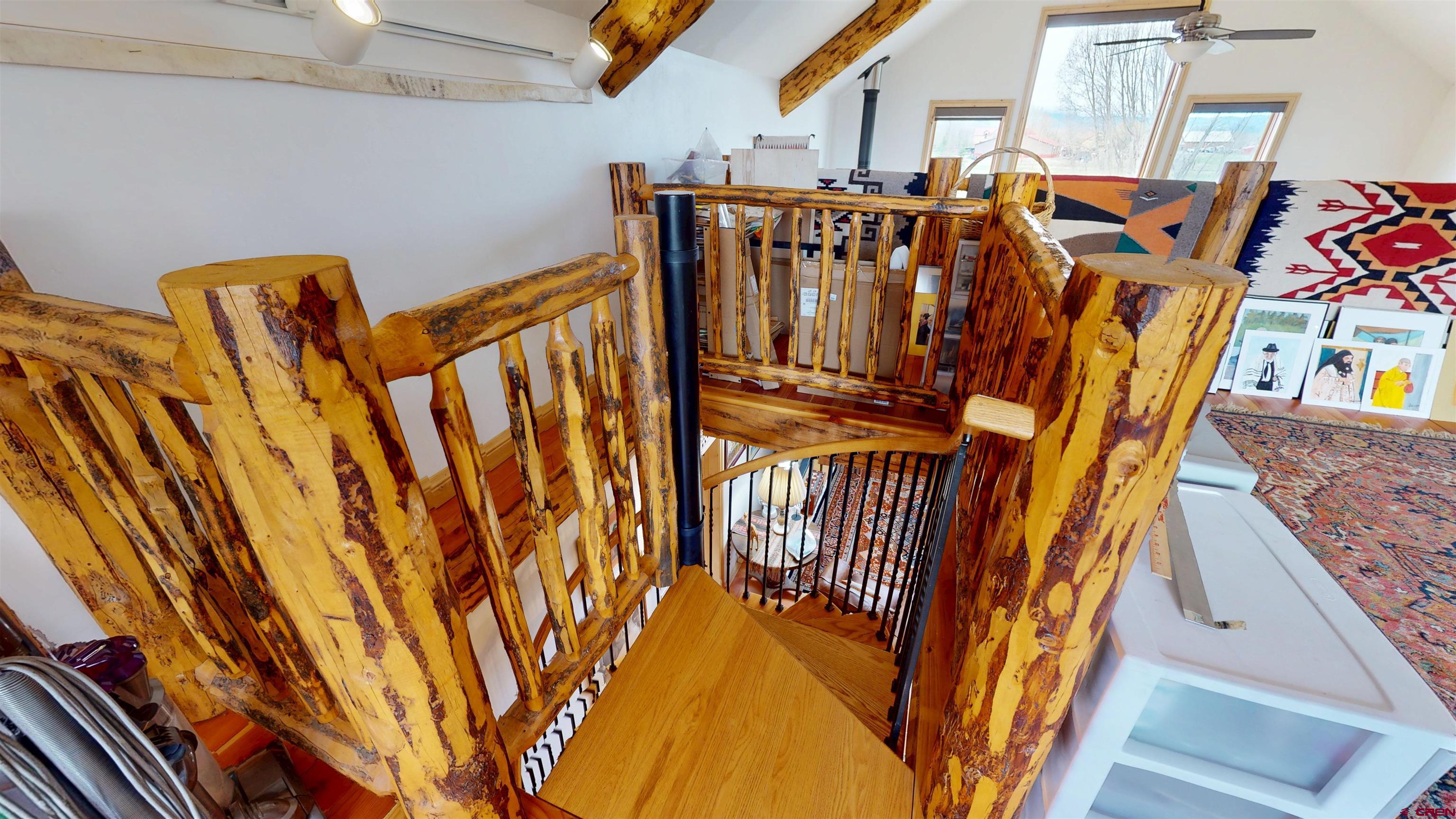 157 Spring Meadow Trail Gunnison, CO 81230 - Photo 40 of 43 Stairs lead to the family loft.