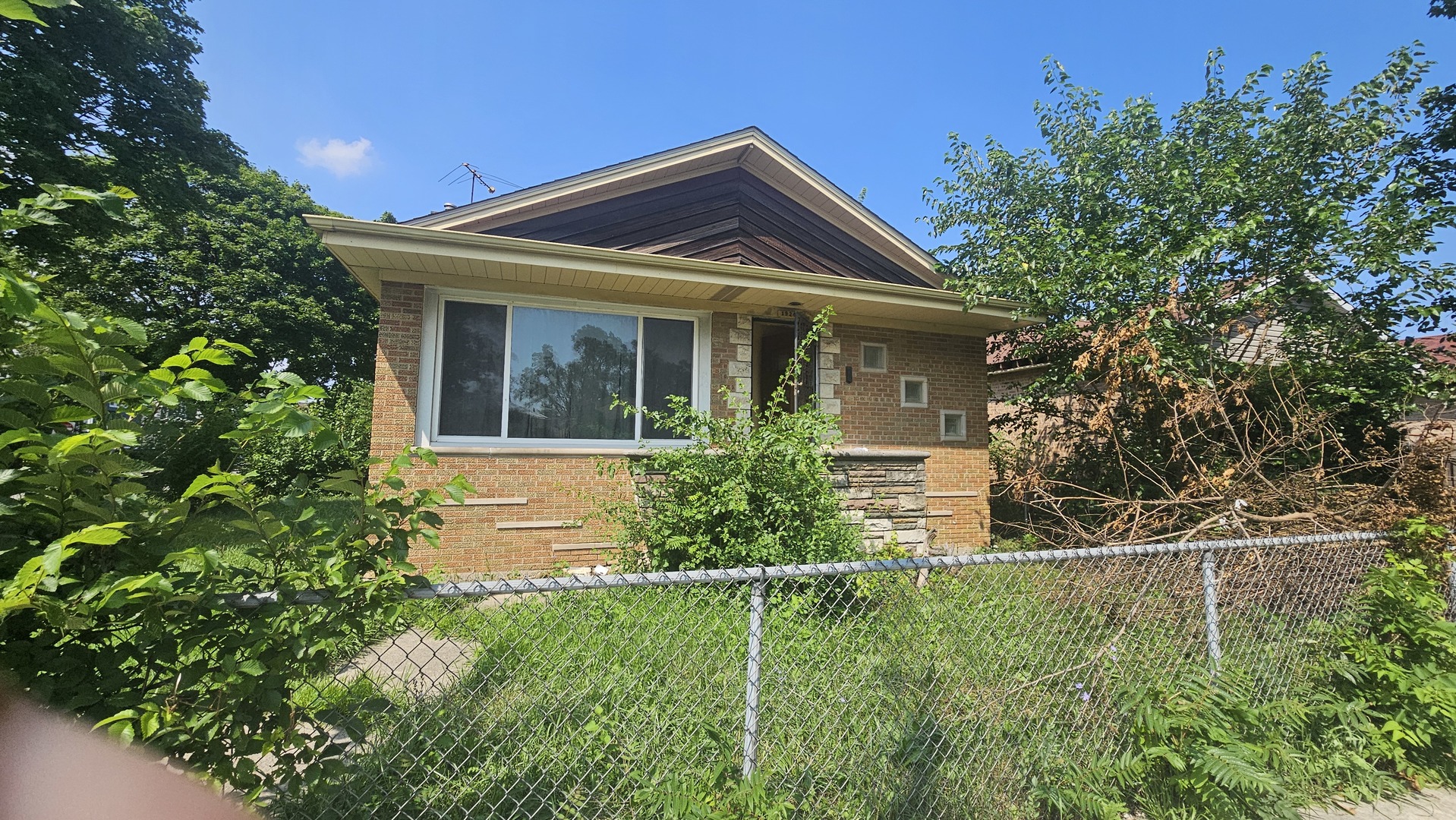 1924 West Marquette Road Chicago, IL 60636 - Photo 2 of 4 a view of a house with a yard