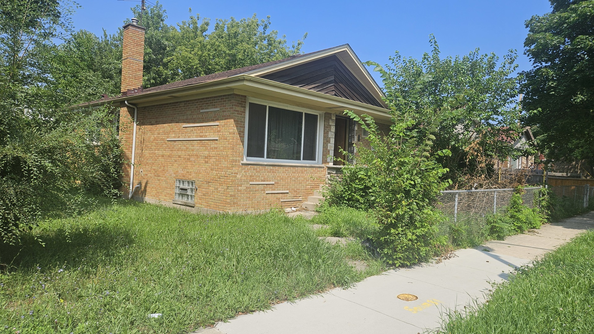 1924 West Marquette Road Chicago, IL 60636 - Photo 4 of 4 a view of a house with a yard