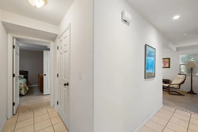 a view of a bedroom from a hallway