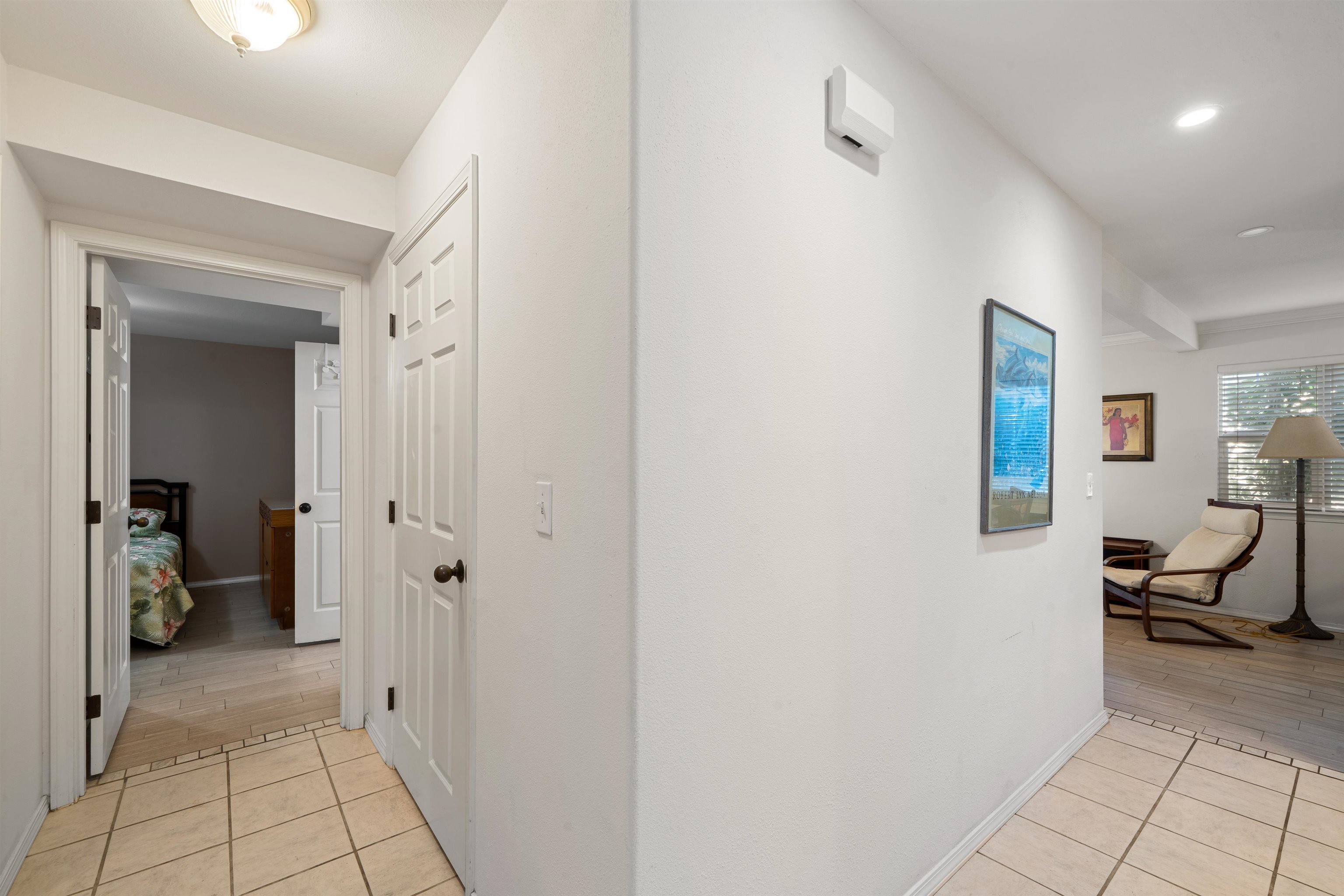 65 Halili Lane, Unit 10F Kihei, HI 96753 - Photo 21 of 48 a view of a bedroom from a hallway