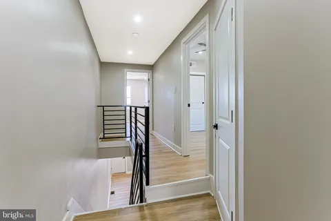 a view of a hallway with staircase