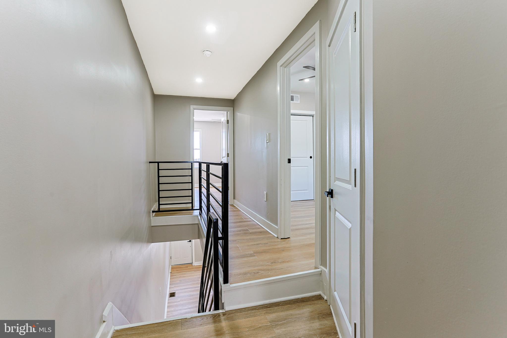 2129 East Tioga Street Philadelphia, PA 19134 - Photo 15 of 32 a view of a hallway with staircase