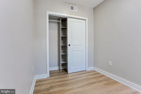 an empty room with closet