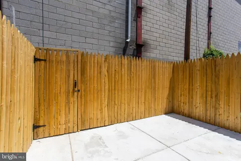 a view of a house with a door and a door