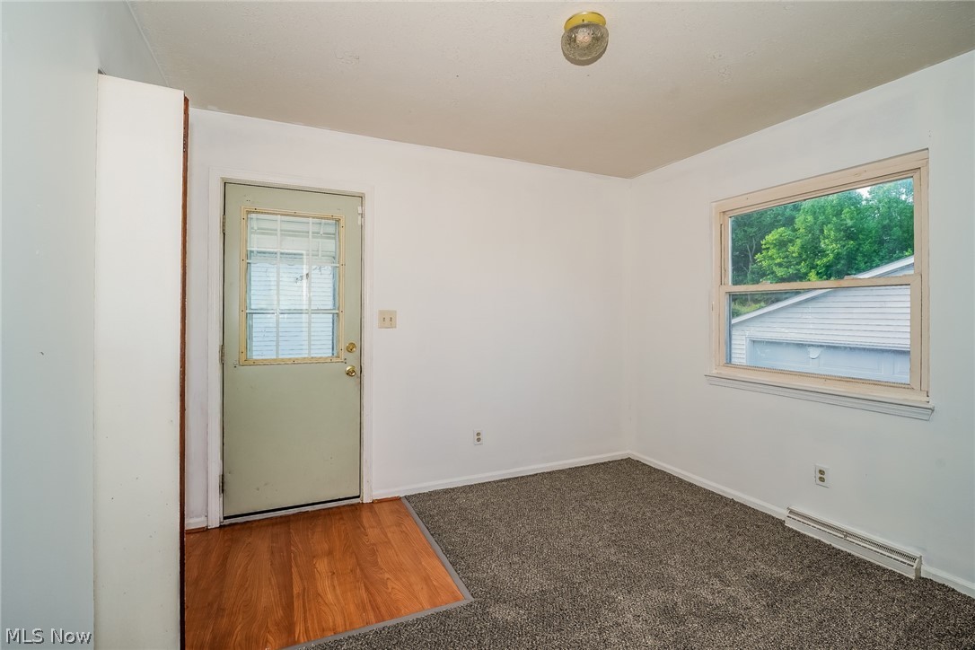 2508 Primewood Road Akron, OH 44305 - Photo 15 of 20 Unfurnished room with a baseboard radiator and hardwood / wood-style flooring