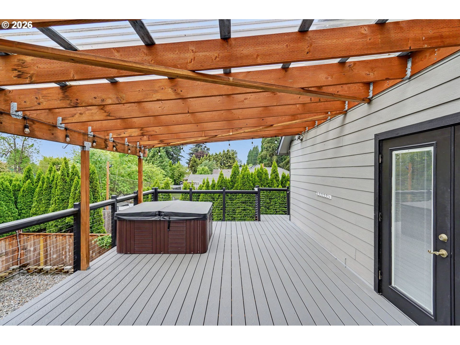 1462 Barnick Road Northeast Keizer, OR 97303 - Photo 39 of 48 a view of a backyard with wooden floor and iron fence