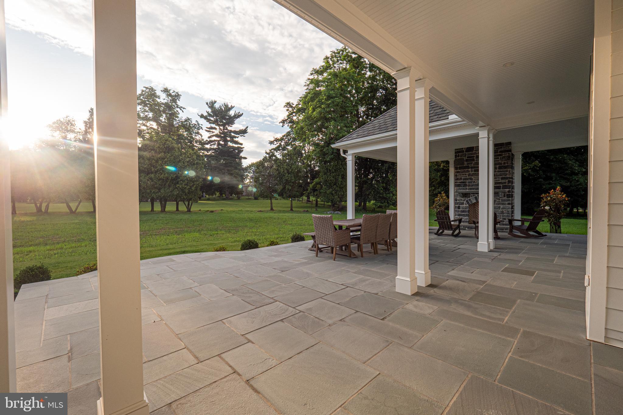 32 Oakland Road Chadds Ford, PA 19317 - Photo 55 of 76 Stone Patio- Partially covered with fireplace