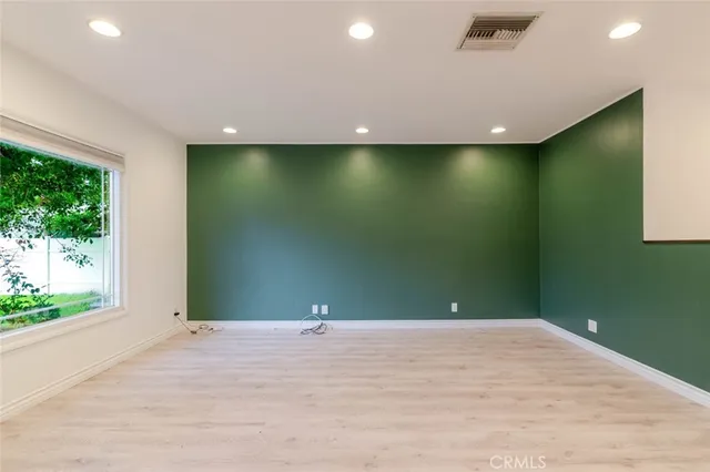 a view of a big room with a fireplace