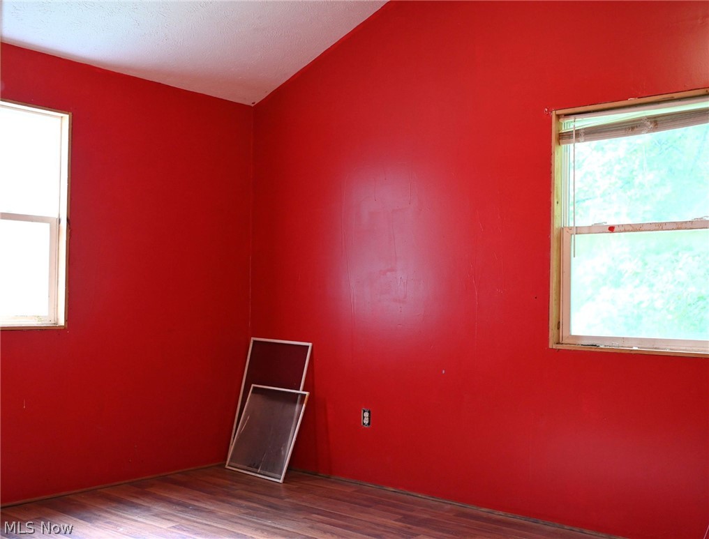 2014-2042 Merrill Road Kent, OH 44240 - Photo 24 of 26 Wood-finish flooring with a vibrant red wall color