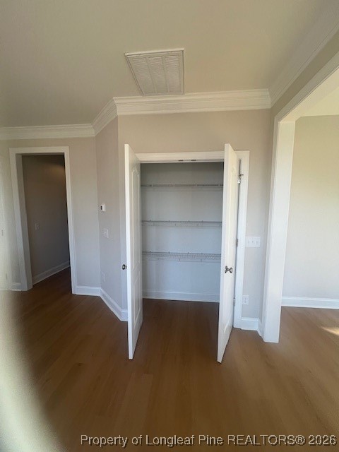 108 Sunny Acres Lane Clinton, NC 28328 - Photo 12 of 33 a view of an empty room and closet with wooden floor