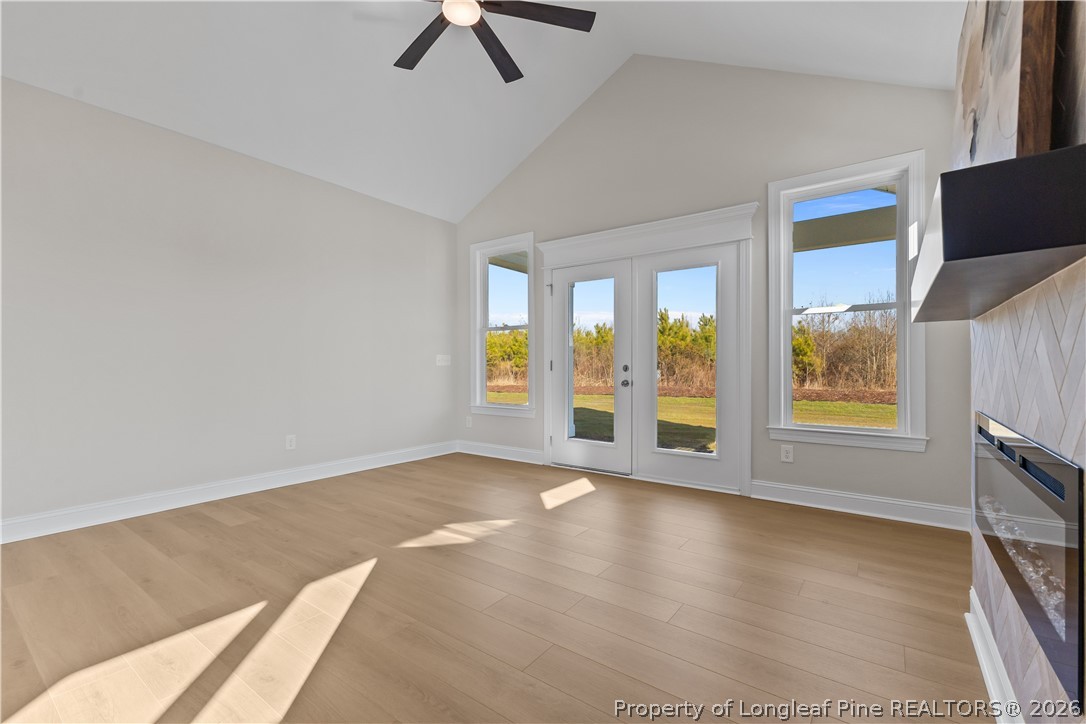 108 Sunny Acres Lane Clinton, NC 28328 - Photo 14 of 30 wooden floor in an empty room with a window