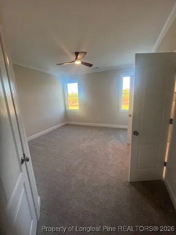 a bathroom with a double vanity sink mirror and shower