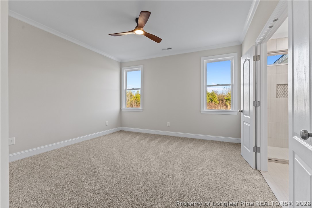 108 Sunny Acres Lane Clinton, NC 28328 - Photo 16 of 30 a view of an empty room and a window