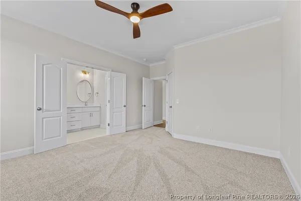 an empty room with closet area