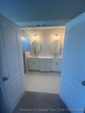 a bathroom with a toilet and a sink