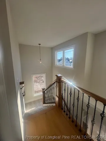 a view of empty room with windows