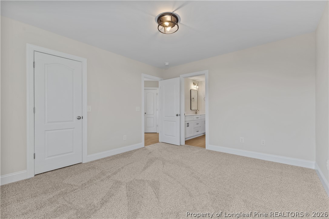 108 Sunny Acres Lane Clinton, NC 28328 - Photo 23 of 30 a view of an empty room and a window