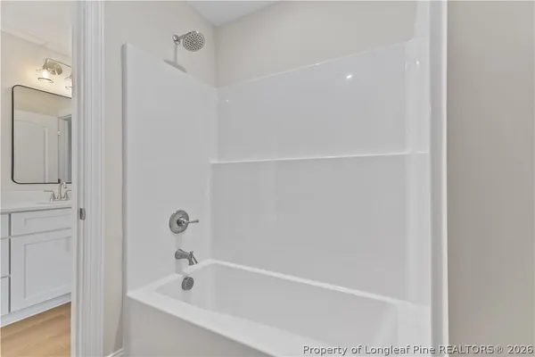 a close view of a bathtub in bathroom
