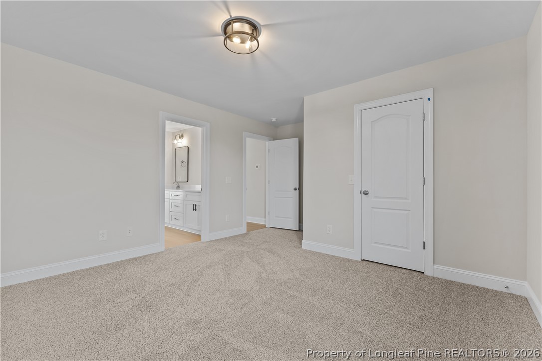 108 Sunny Acres Lane Clinton, NC 28328 - Photo 26 of 30 an empty room with windows and entrance
