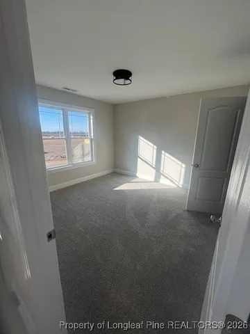 a view of a house with a swimming pool