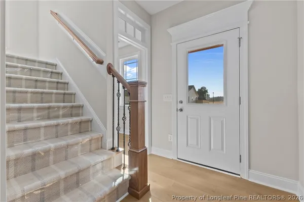 a view of front door with stairs