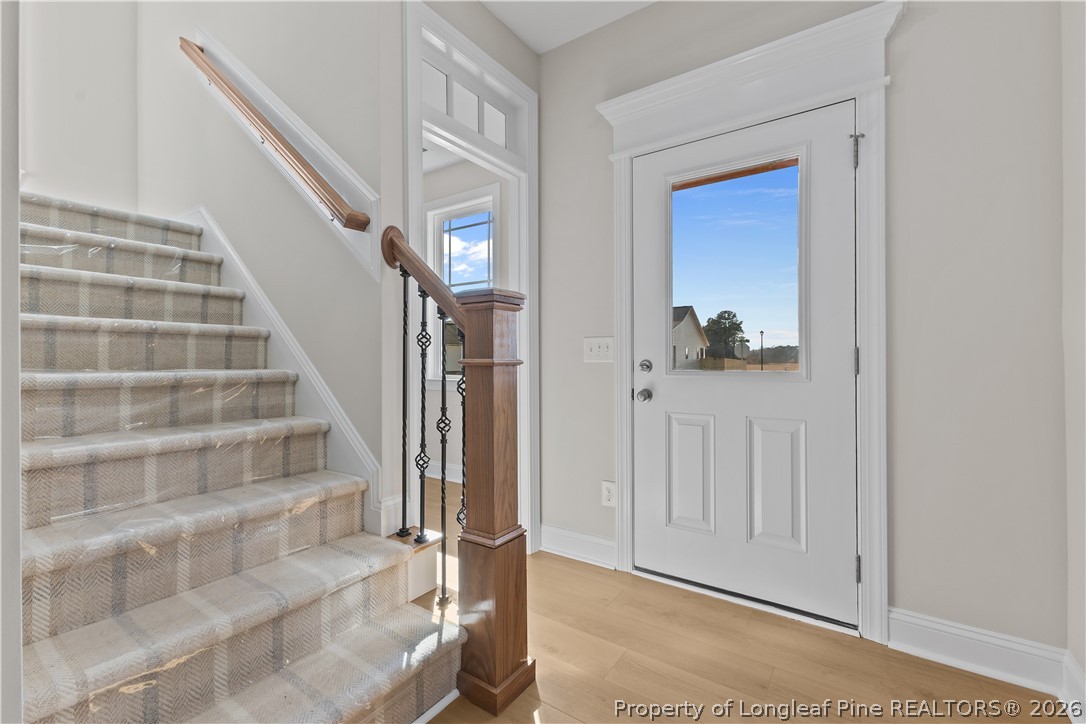 108 Sunny Acres Lane Clinton, NC 28328 - Photo 4 of 30 a view of front door with stairs