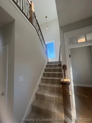 a view of hallway with stairs