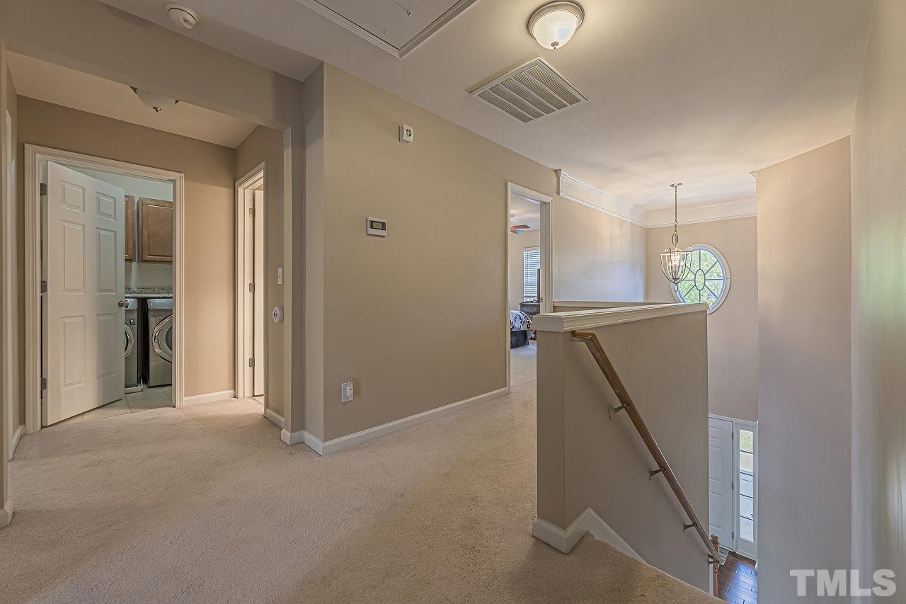 7759 San Gabriel Street Raleigh, NC 27613 - Photo 17 of 30 a view of a hallway with entryway