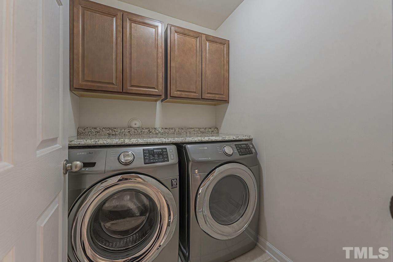 7759 San Gabriel Street Raleigh, NC 27613 - Photo 18 of 30 a close up view of washer and dryer
