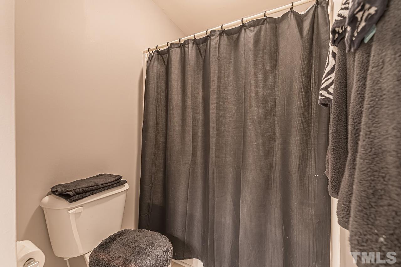 7759 San Gabriel Street Raleigh, NC 27613 - Photo 25 of 30 a close up of a toilet