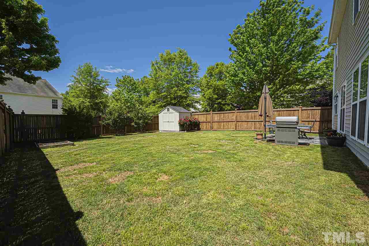 7759 San Gabriel Street Raleigh, NC 27613 - Photo 29 of 30 a view of a backyard