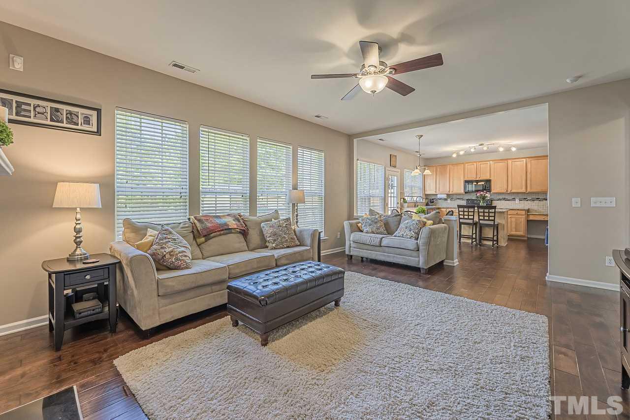 7759 San Gabriel Street Raleigh, NC 27613 - Photo 10 of 30 a living room with furniture and a large window
