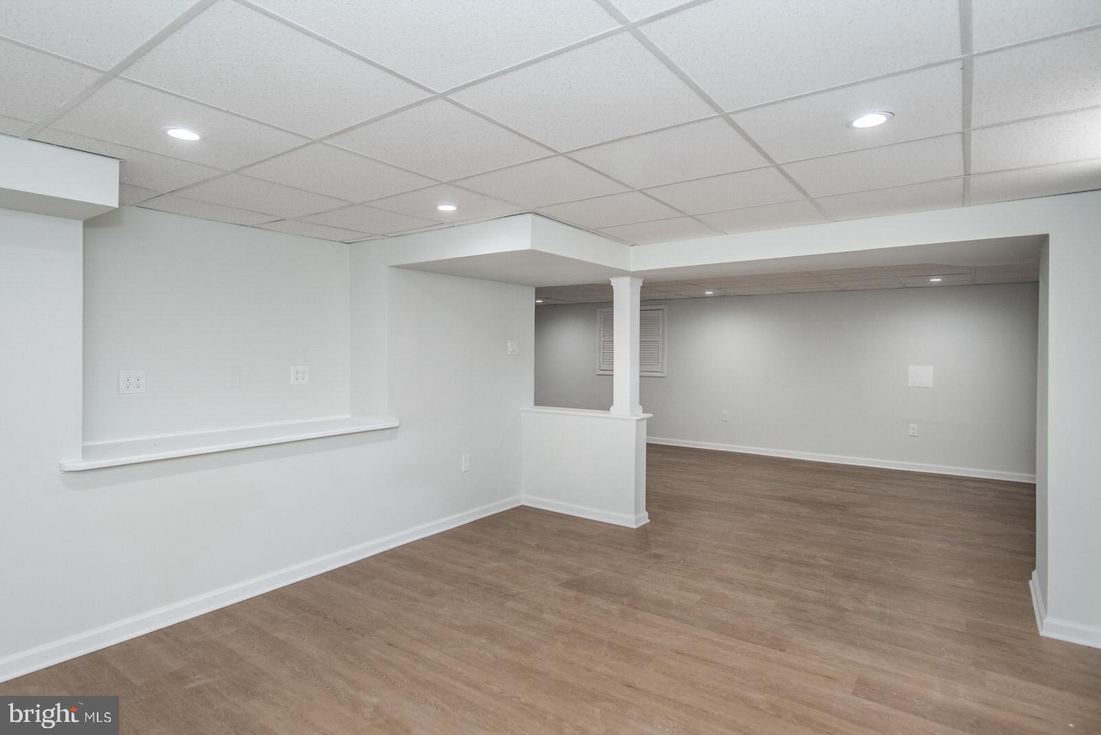 558 Sentinel Road Moorestown, NJ 08057 - Photo 124 of 144 an empty room with wooden floor and windows