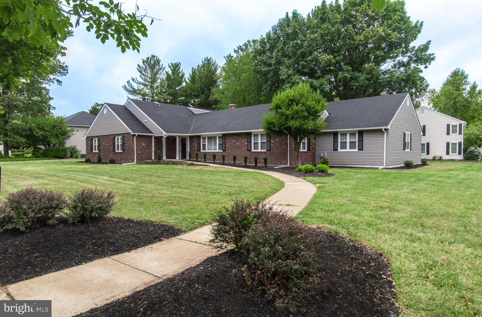 558 Sentinel Road Moorestown, NJ 08057 - Photo 13 of 144 a front view of a house with yard and green space