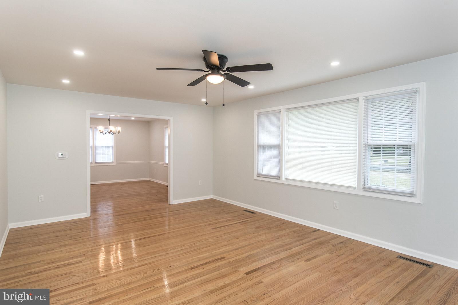 558 Sentinel Road Moorestown, NJ 08057 - Photo 23 of 144 a view of an empty room with wooden floor and a window
