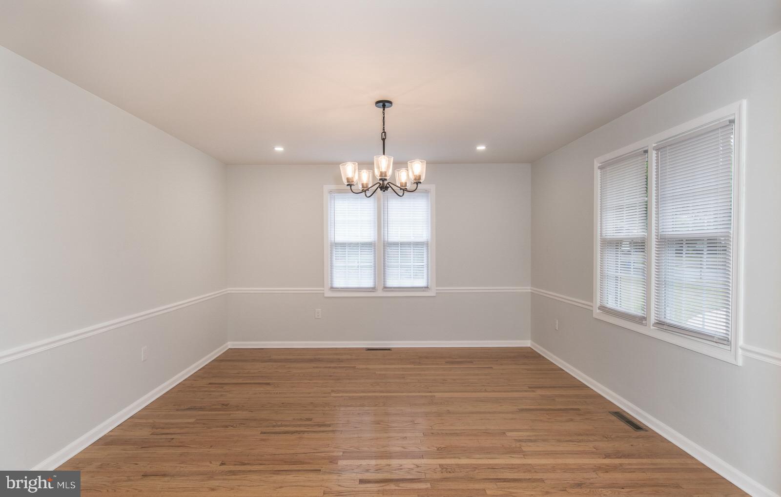 558 Sentinel Road Moorestown, NJ 08057 - Photo 30 of 144 wooden floor in an empty room with a window
