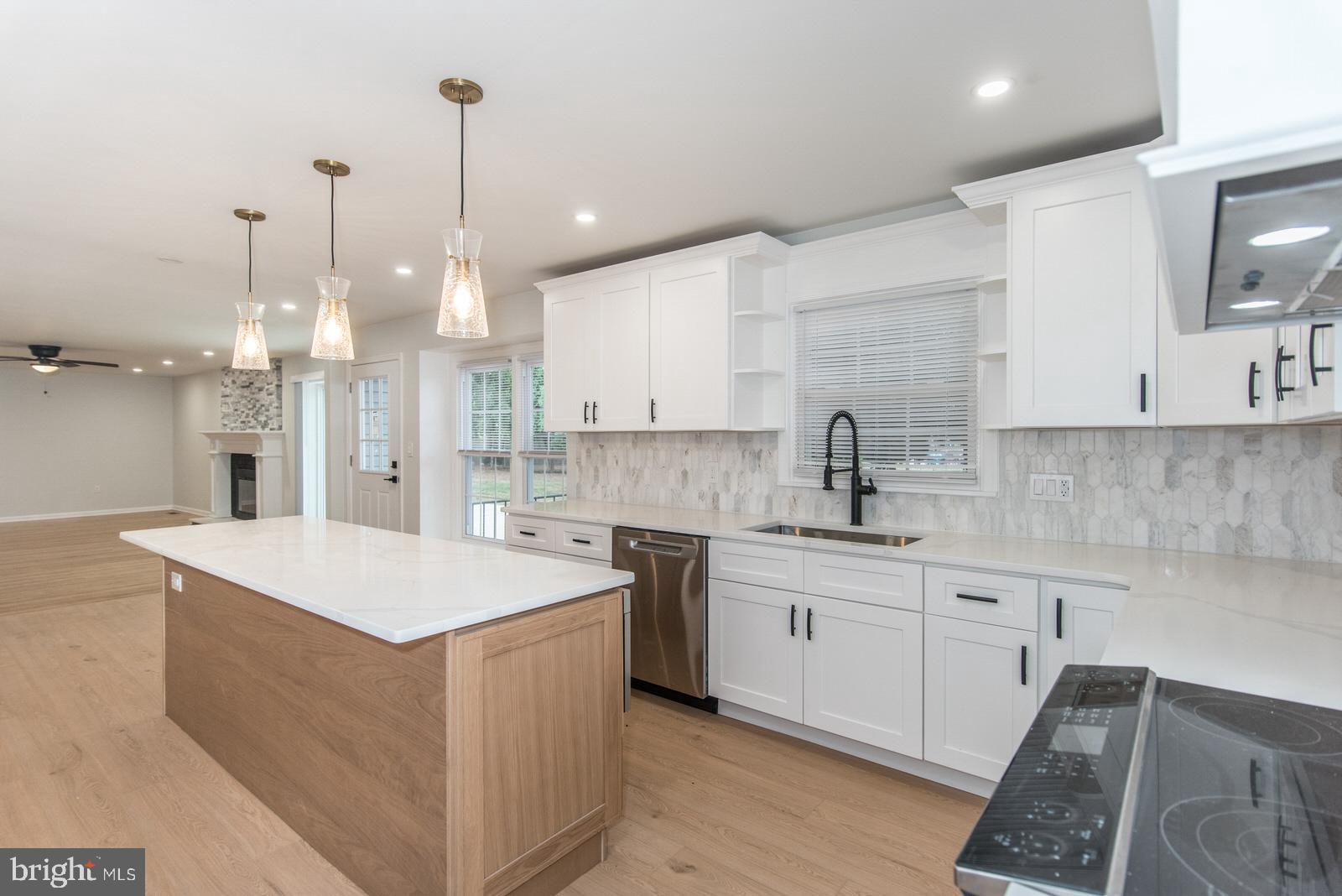 558 Sentinel Road Moorestown, NJ 08057 - Photo 33 of 144 a large white kitchen with a sink and refrigerator
