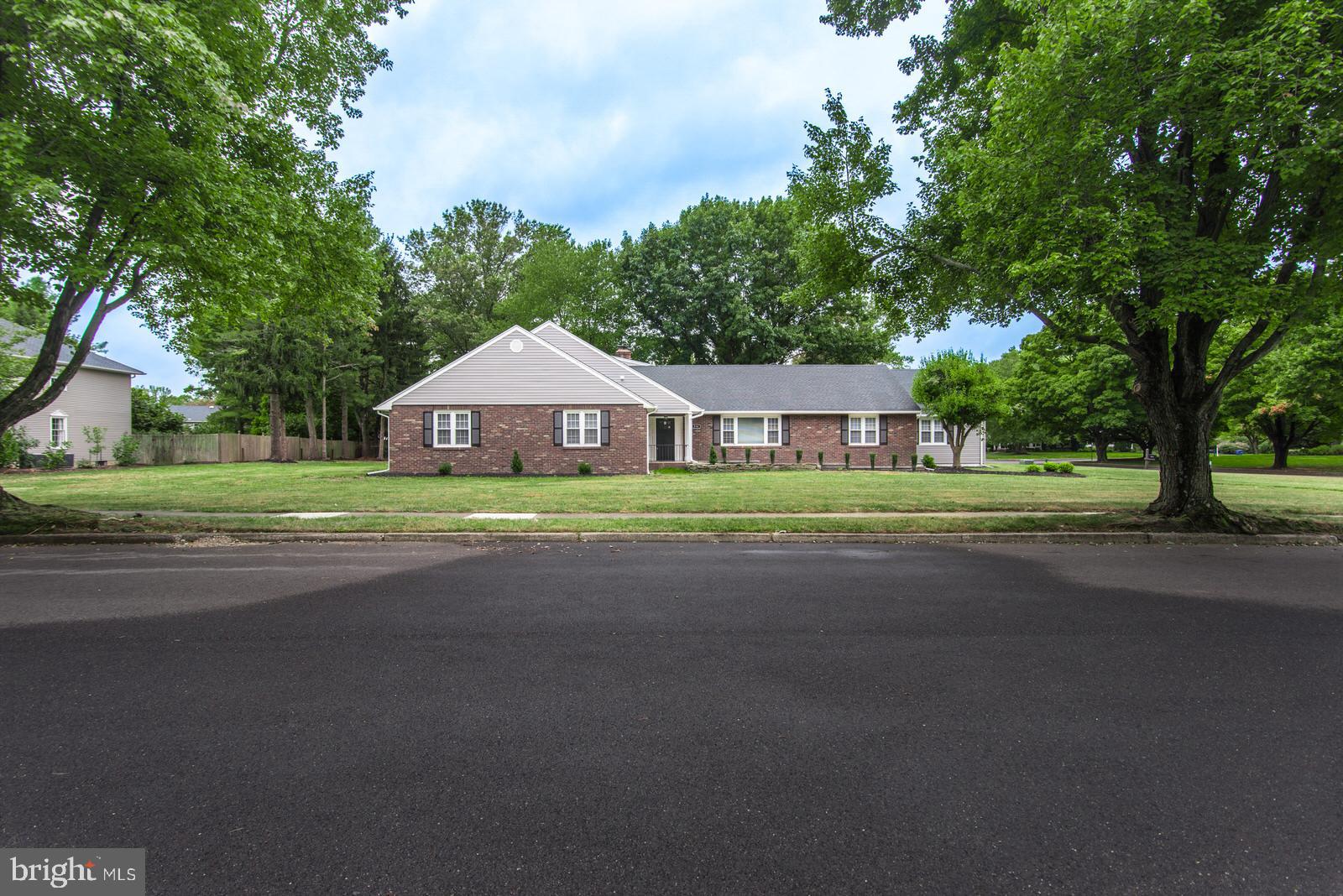 558 Sentinel Road Moorestown, NJ 08057 - Photo 4 of 144 a house with huge green field in front of it