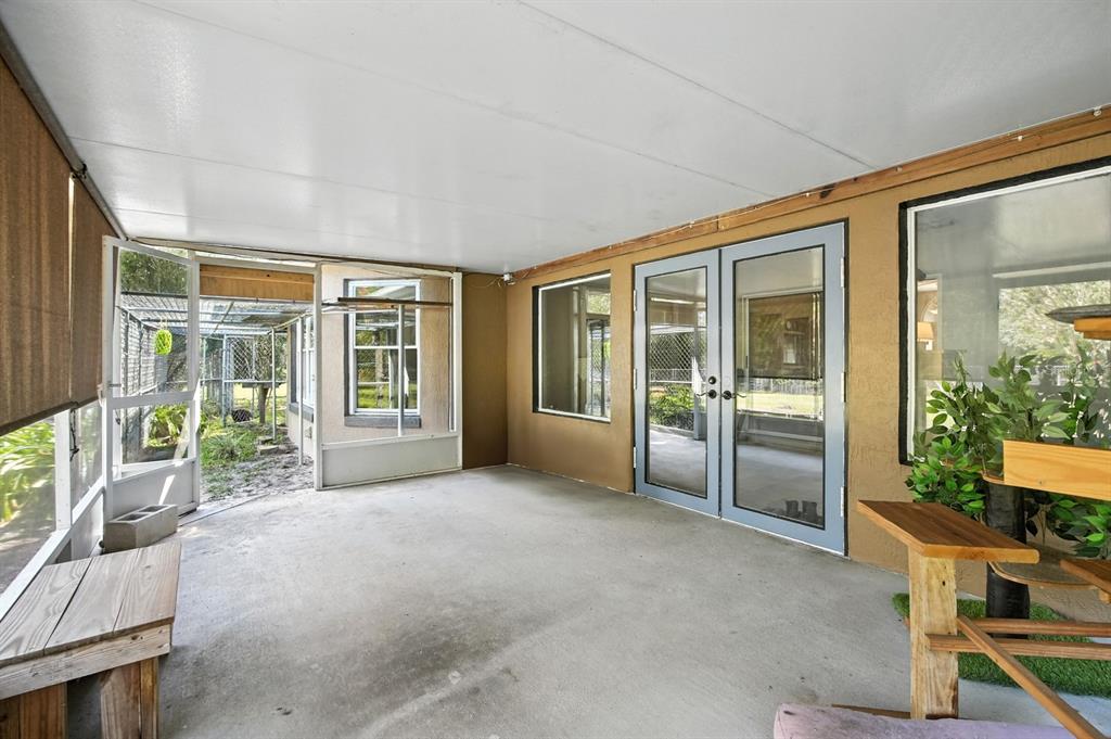 29933 Fullerville Road DeLand, FL 32720 - Photo 28 of 57 a view of an entryway with wooden floor and a livingroom